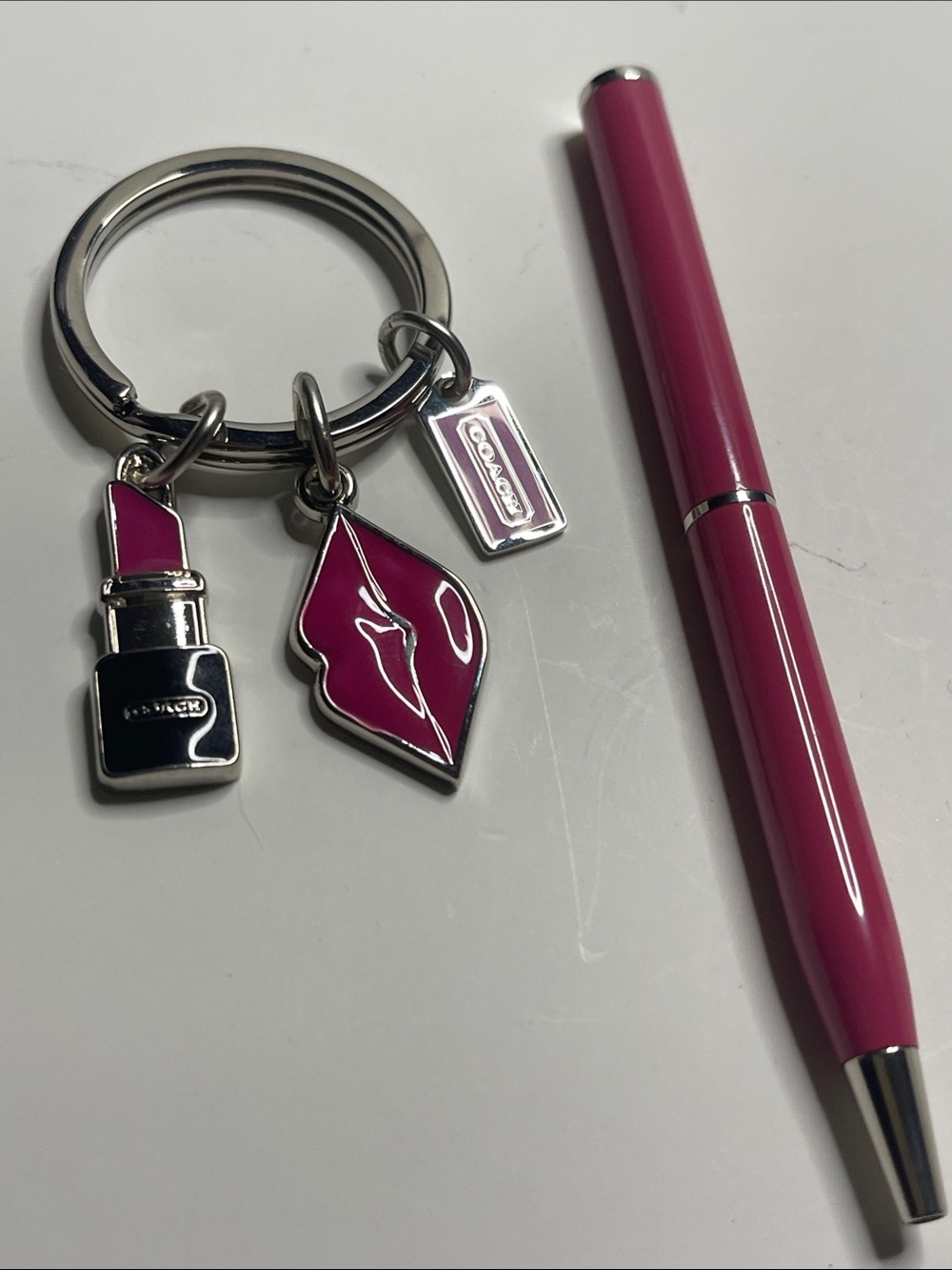 Coach Pink Lipstick Charm Keychain and Coach Pen